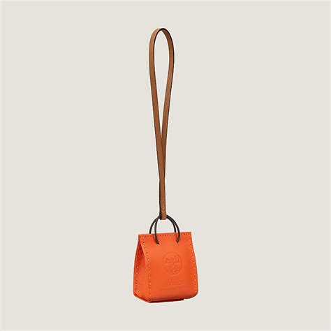 hermes mini orange bag charm|hermes twilly on bag.